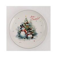 IRIS kerámia tányér, hóemberek a karácsonyfa előtt, "merry christmas" felirat 25 cm
